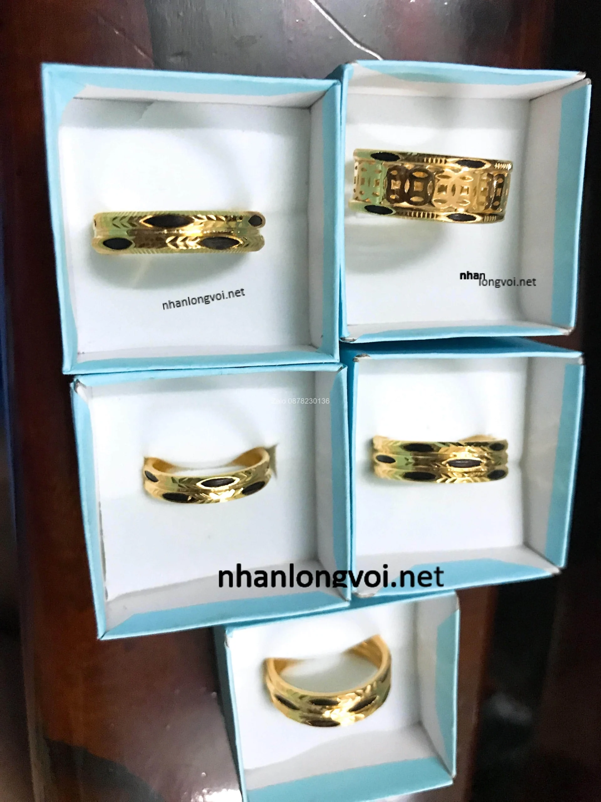 Nhẫn vàng Mi Hồng họa tiết long vũ